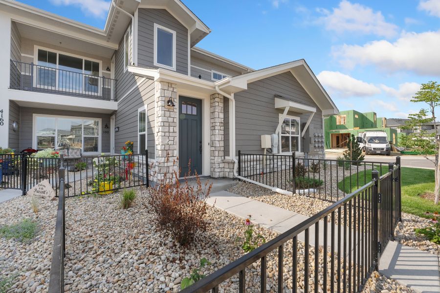 Exterior details and patio area of a home in The Lakes at Centerra, Loveland (Image 4).