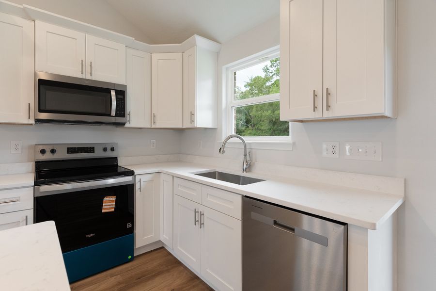 Furnished interior view inside a new home in Southern Charm, Crestview (Image 6). Furnished interior view inside a new home in Southern Charm, Crestview (Image 6).