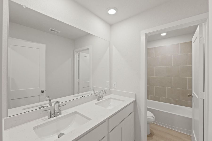 Furnished interior view inside a new home in River Ranch Trails, Dayton (Image 8).