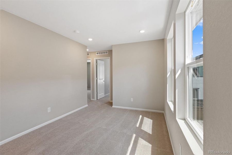 Spacious, unfurnished interior of a new home in Woodrose at Painted Prairie, Aurora (Image 33).