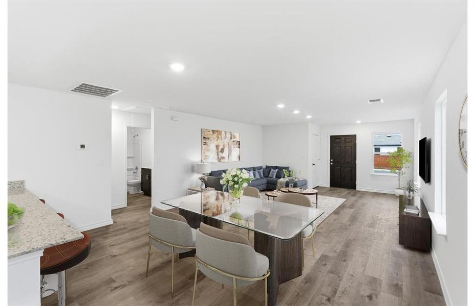 Virtually Staged - Dining area off kitchen with large windows