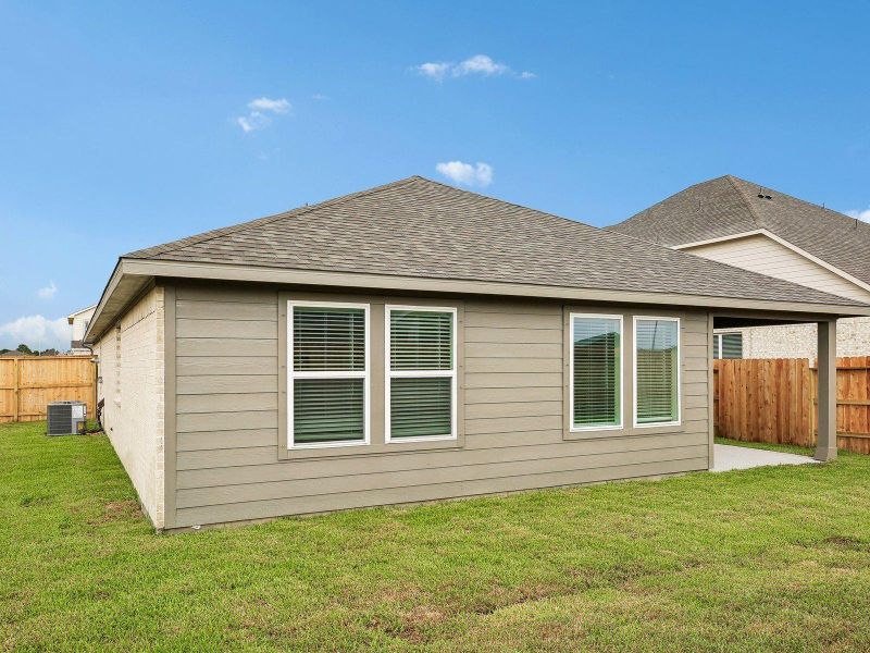 Exterior details and patio area of a home in Heights of Barbers Hill, Baytown (Image 21).