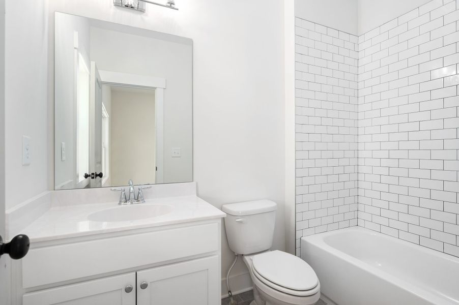 Representative furnished interior of a home built from the Chatsworth by Peachtree Residential in White Post on Lake Lanier, Gainesville (Image 6).