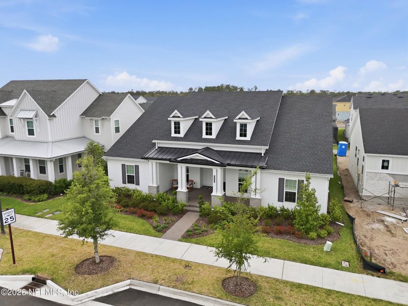 Front exterior of a new home in Seven Pines 70' Rear Entry, Jacksonville, FL, highlighting curb appeal (Image 29).
