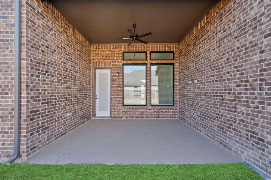 Exterior details and patio area of a home in The Trails, New Caney (Image 3).