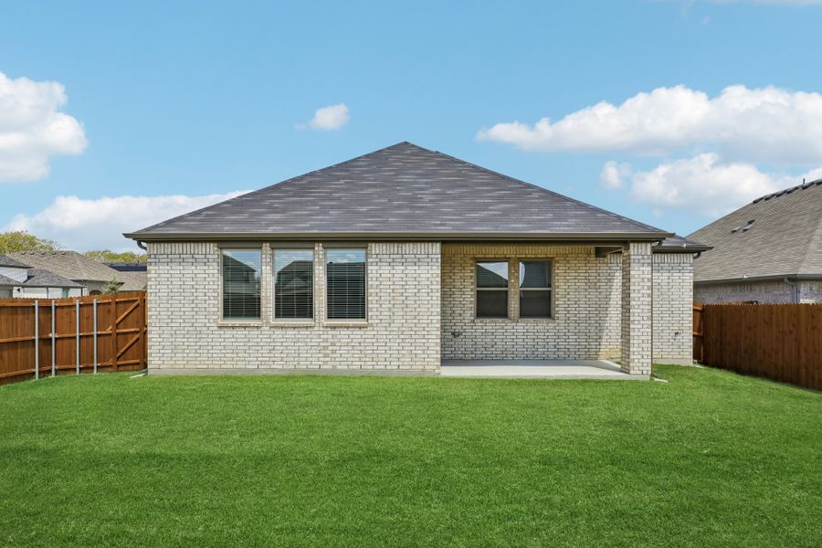 Covered Patio in the Holden home plan by Trophy Signature Homes
