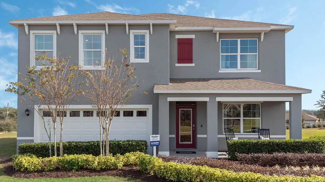 Representative exterior photo of a completed home built from the HAYDEN by D.R. Horton in Cascades, Davenport, FL (Image 1).