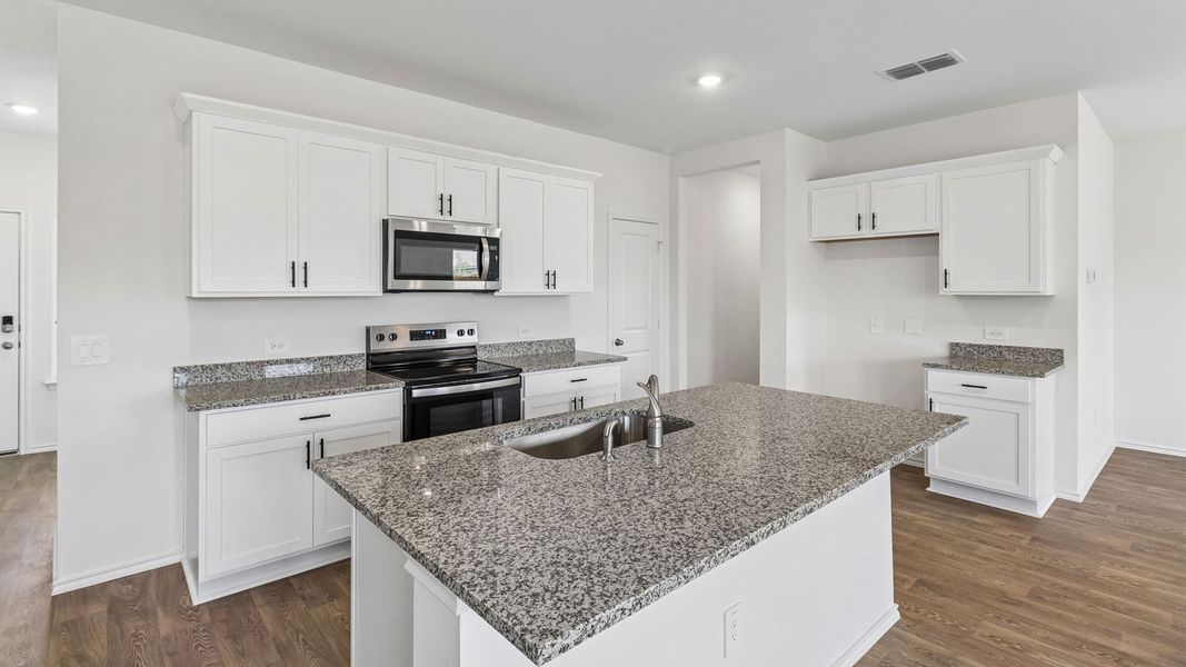Furnished interior view inside a new home in Palomino, Manor (Image 6).