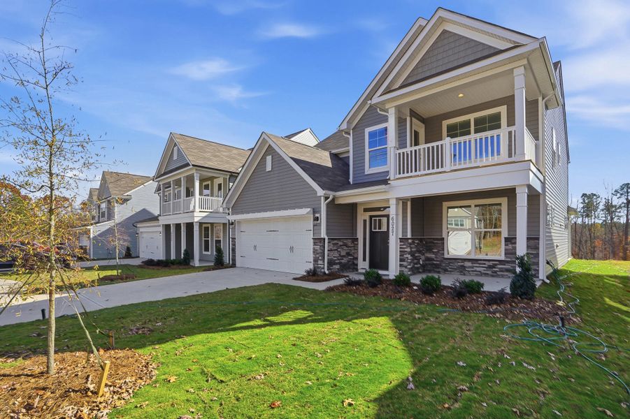 Front exterior of a new home in Grier Meadows, Charlotte, NC, highlighting curb appeal (Image 25).