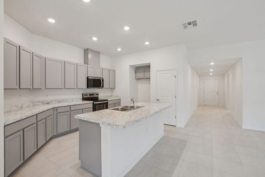 Furnished interior view inside a new home in The Preserve at Legends Pointe II, Hudson (Image 4).