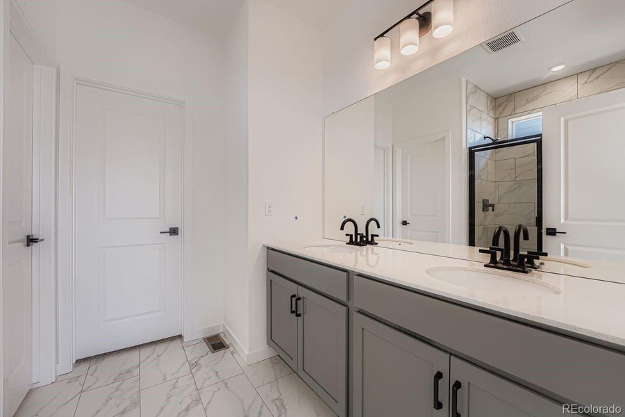 Images not from actual home, but are from same floor plan.