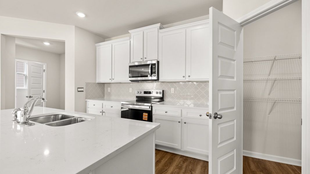 Representative furnished interior of a home built from the Ashton by D.R. Horton in Brookland Commons, Monroe (Image 10).