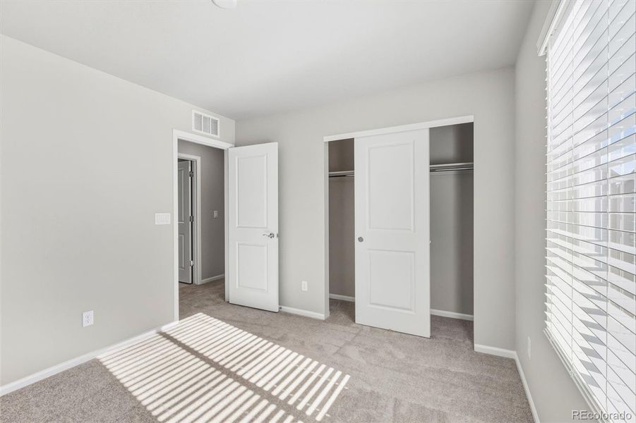 Spacious, unfurnished interior of a new home in Woodrose at Painted Prairie, Aurora (Image 25).