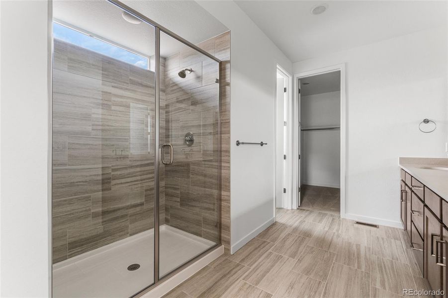 Furnished interior view inside a new home in The Aurora Highlands, Aurora (Image 7).