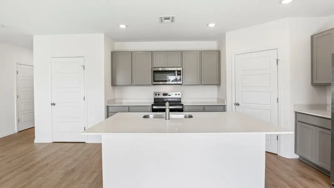 Representative furnished interior of a home built from the Crestview by D.R. Horton in Crosswinds, Haines City (Image 5).