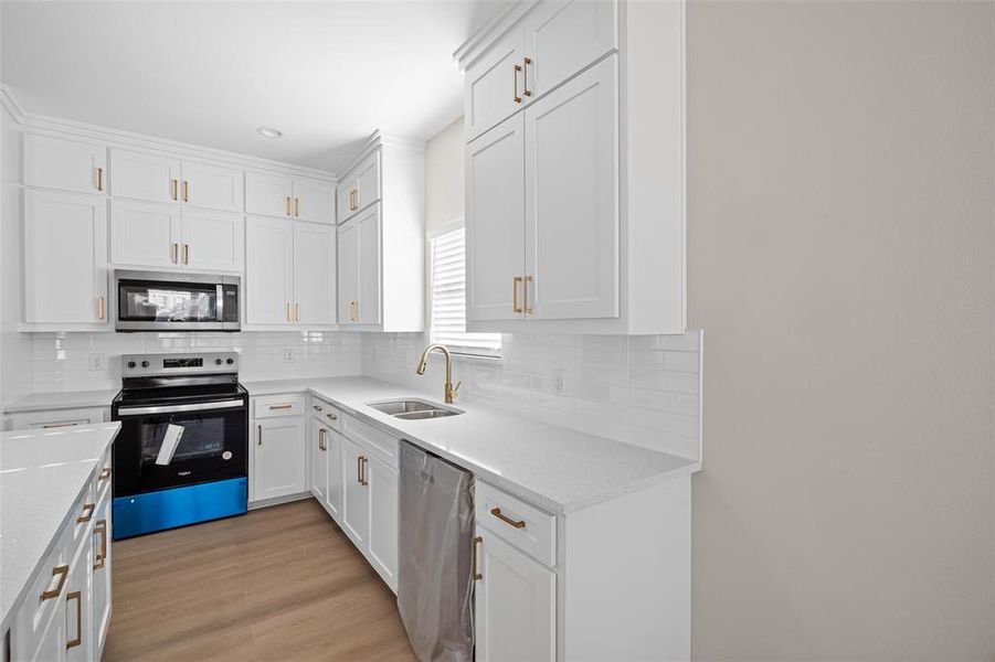 Elegant white countertops and cabinets