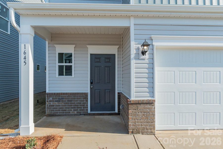 Exterior details and patio area of a home in Country Club Village, Salisbury (Image 2). Exterior details and patio area of a home in Country Club Village, Salisbury (Image 2).