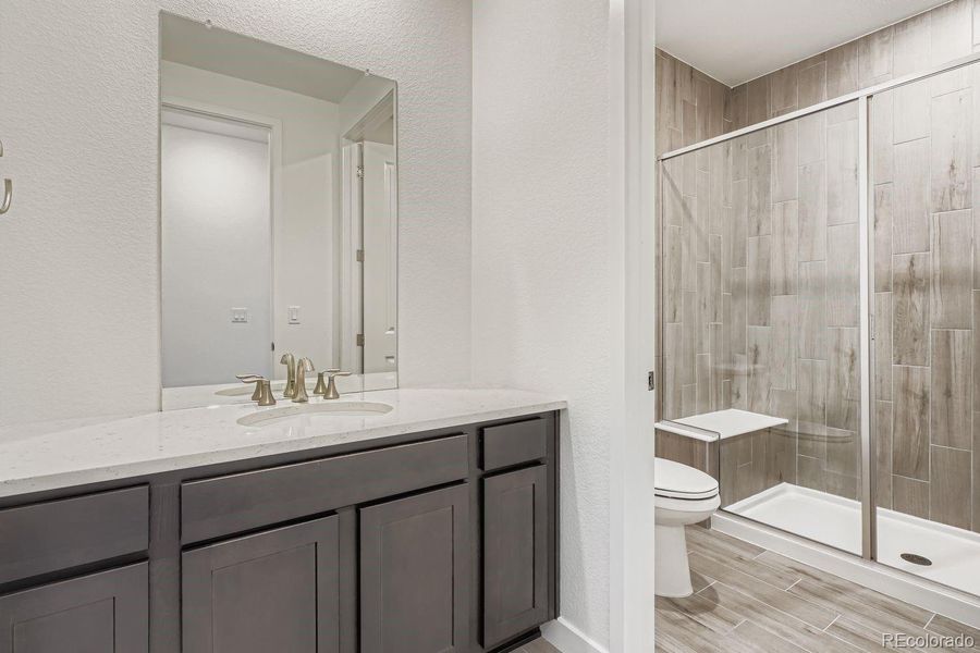 Furnished interior view inside a new home in Macanta: The Grand Collection, Castle Rock (Image 11).