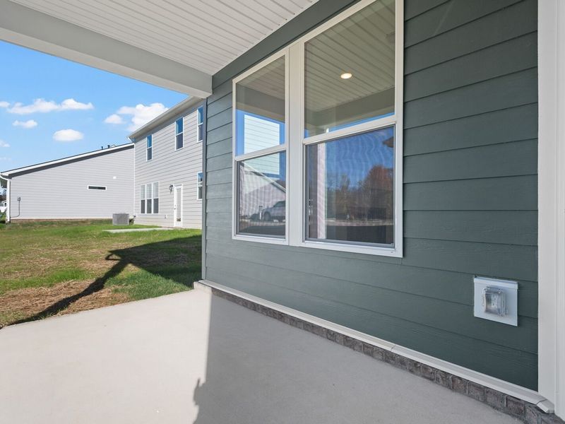 Exterior details and patio area of a home in Sage Farms, White House (Image 4).