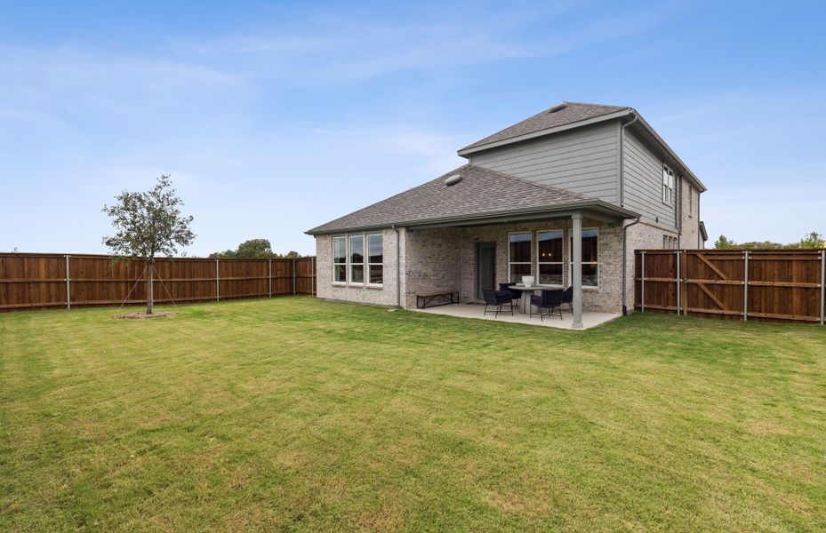 Exterior details and patio area of a home in Wilson Creek Meadows, Weston (Image 2).