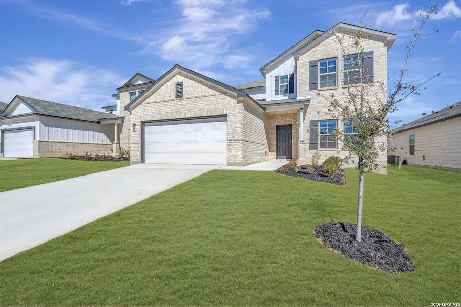 Front exterior of a new home in Paloma Park, Converse, TX, highlighting curb appeal (Image 19).