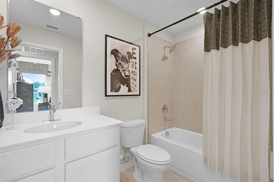 Furnished interior view inside a new home in Delaney Reserve, Deland (Image 17).