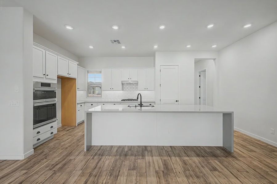 Furnished interior view inside a new home in Valencia at Granite Vista, Waddell (Image 7).