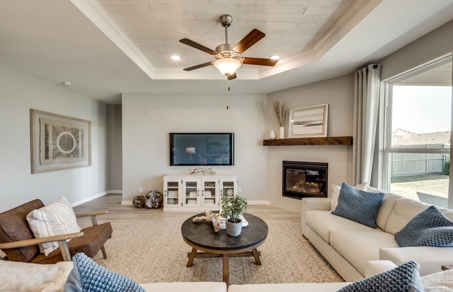 Spacious gathering room with tray ceiling