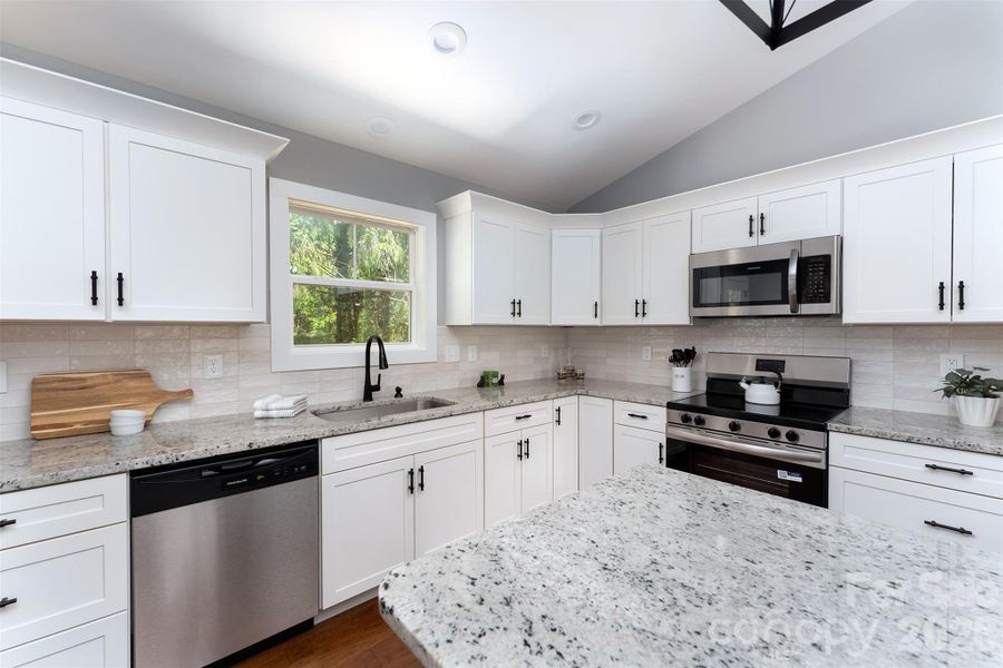 Furnished interior view inside a new home in , Candler (Image 15).