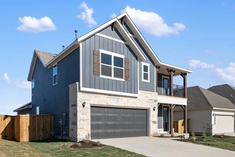 Front exterior of a new home in Patterson Ranch, Georgetown, TX, highlighting curb appeal (Image 24).