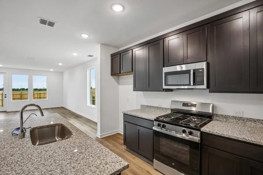 Furnished interior view inside a new home in Parkton Square, Kyle (Image 8).