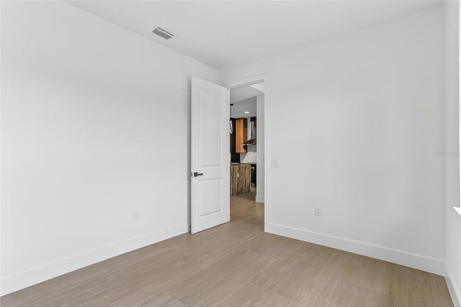 Spacious, unfurnished interior of a new home in , Port Charlotte (Image 44).