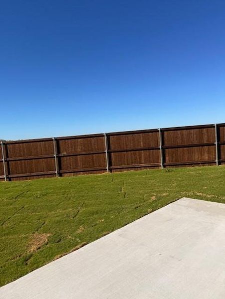 Exterior details and patio area of a home in , Venus (Image 3).