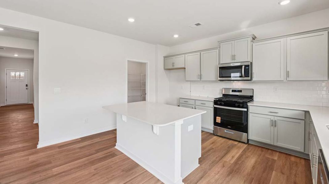 Representative furnished interior of a home built from the Hanover by D.R. Horton in Granite Falls, Lancaster (Image 5).