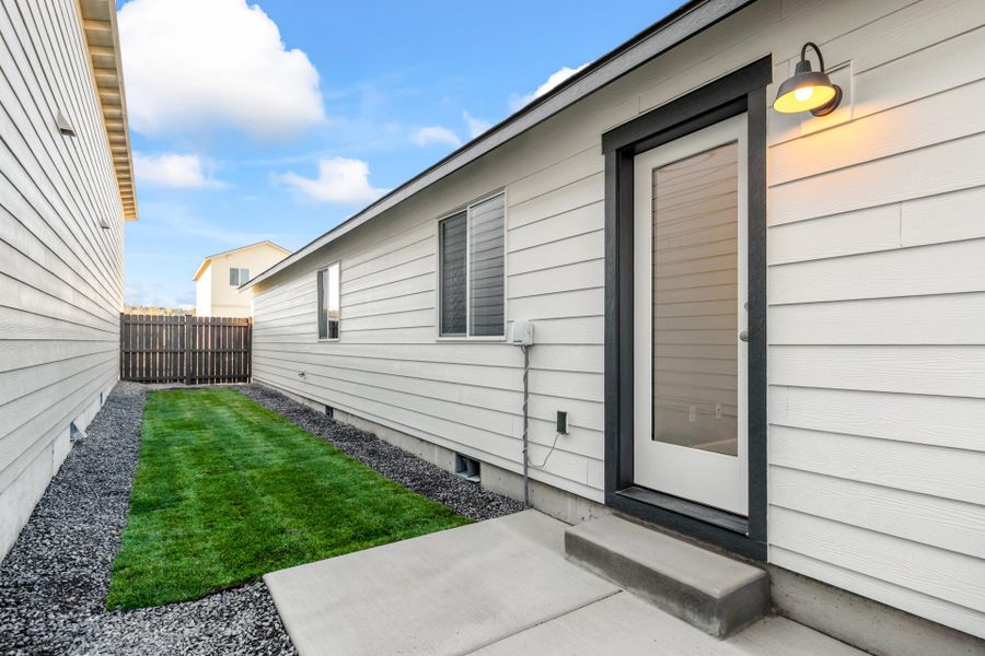 Exterior details and patio area of a home in Feather Ridge, Redmond (Image 4).