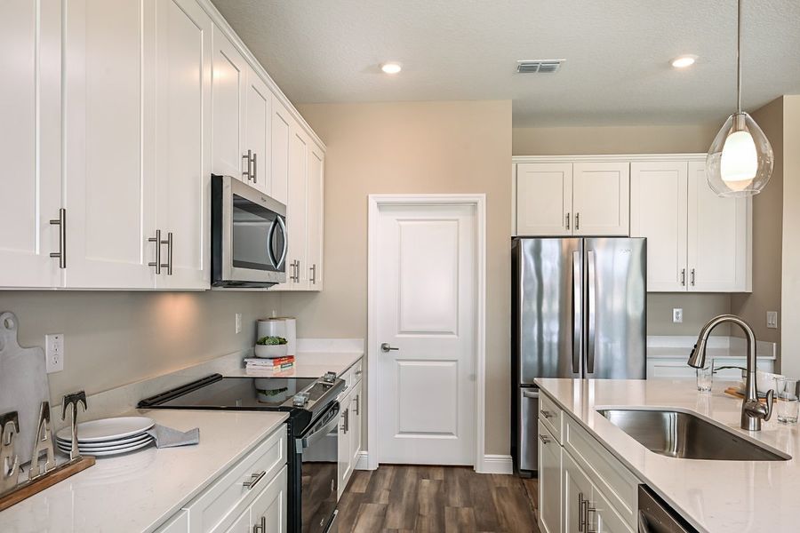 Representative furnished interior of a home built from the Mariposa by Casa Fresca Homes in Mirada, San Antonio (Image 8).