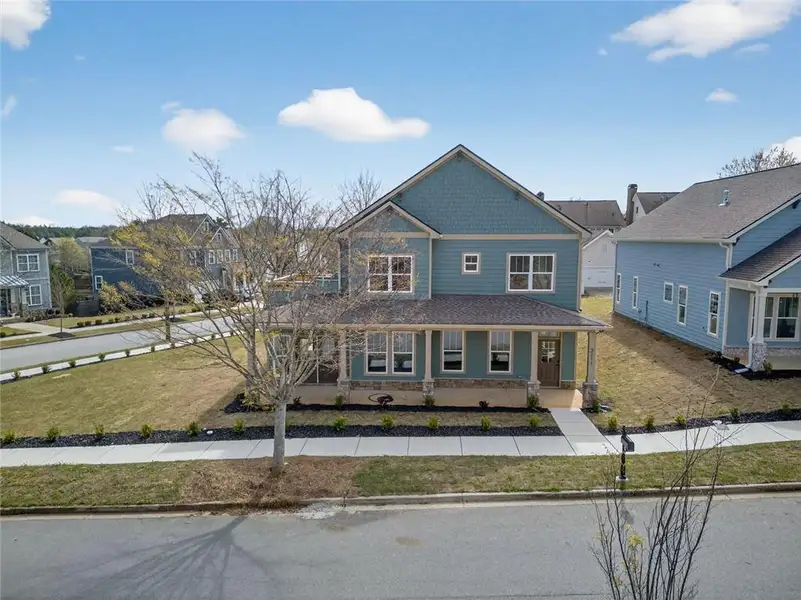 Front exterior of a new home in , Douglasville, GA, highlighting curb appeal (Image 19). Front exterior of a new home in , Douglasville, GA, highlighting curb appeal (Image 19).