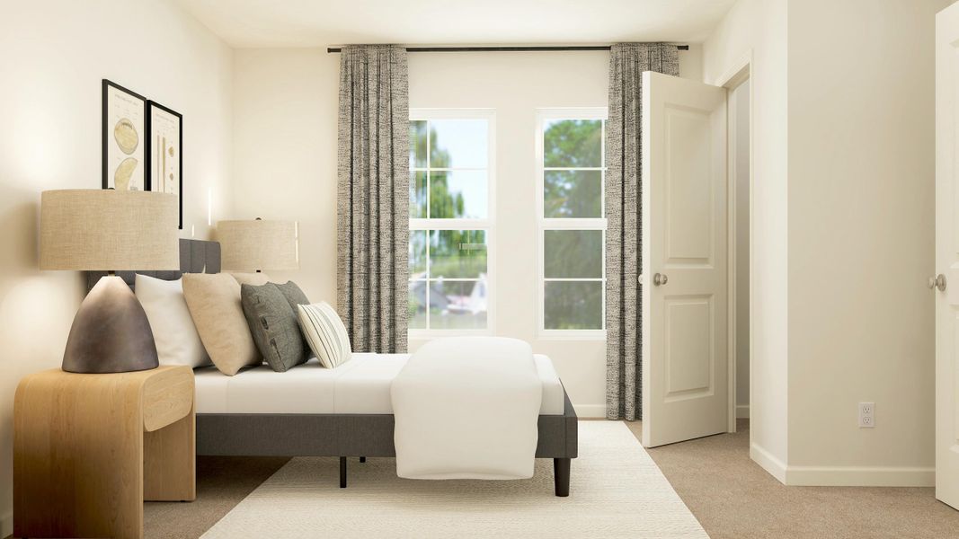 A living room with a couch and a chair. A living room with a couch and a chair.