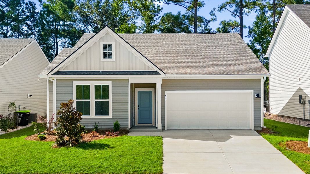 Representative exterior photo of a completed home built from the Easton by DRB Homes in Bluffs at Sun Colony, Longs, SC (Image 22).