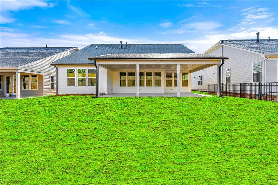 Exterior details and patio area of a home in Cresswind Georgia at Twin Lakes, Hoschton (Image 2).