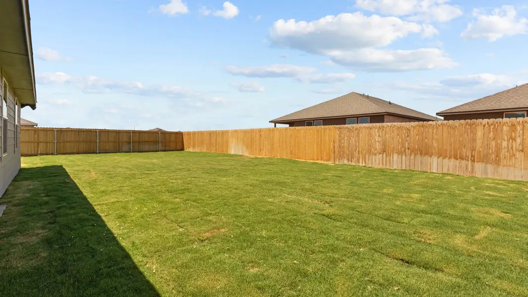 Representative exterior photo of a completed home built from the KINGSTON by D.R. Horton in Homestead at Parks Bell Ranch, Odessa, TX (Image 3).