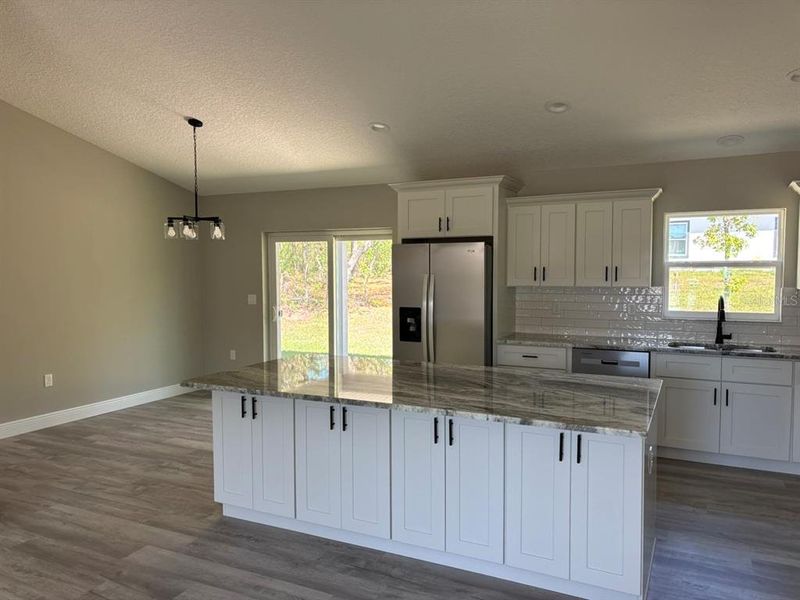 Furnished interior view inside a new home in , Dunnellon (Image 8).