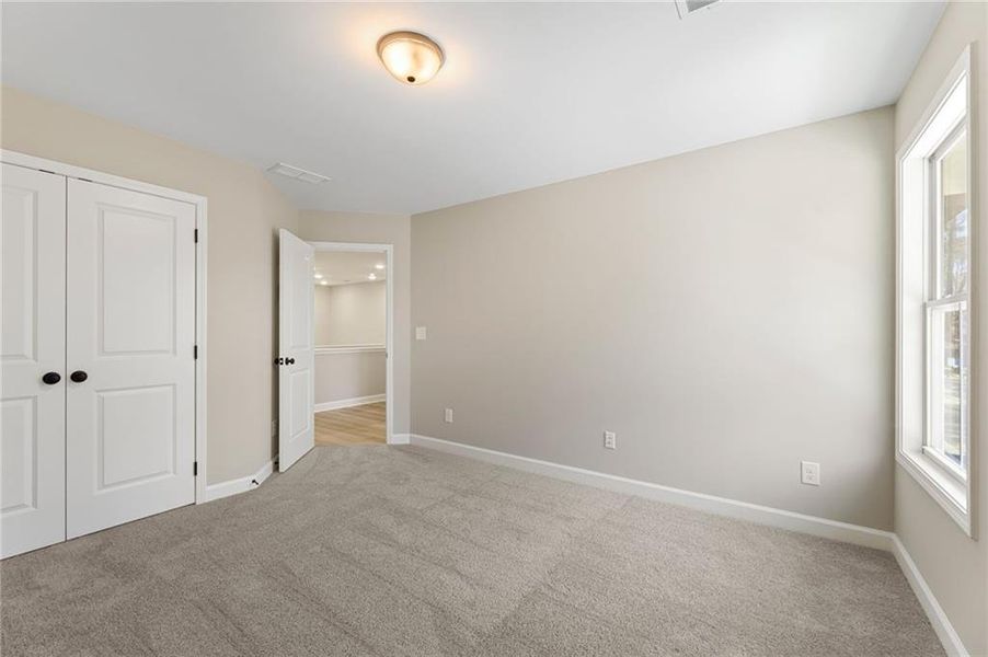 Spacious, unfurnished interior of a new home in River Walk Place, Lawrenceville (Image 19).