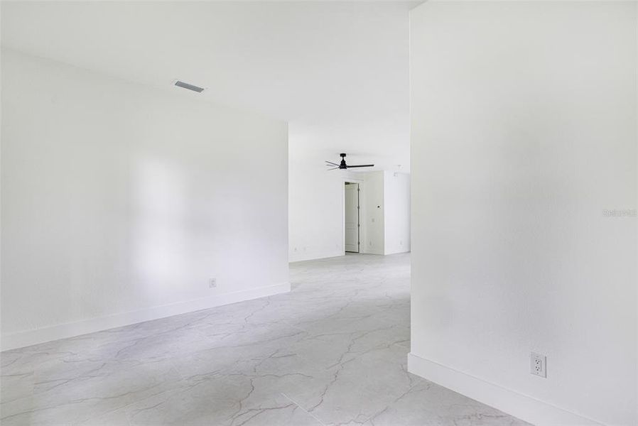 Spacious, unfurnished interior of a new home in , Port Charlotte (Image 31).