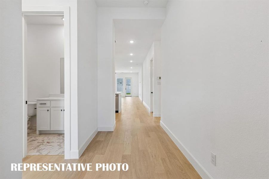 Featuring sight lines from the front through to the rear of the home and ample wall space to display art work, you'll love inviting family and friends into your new dream home!  REPRESENTATIVE PHOTO