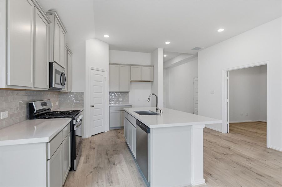 Furnished interior view inside a new home in Westland Ranch, League City (Image 9).