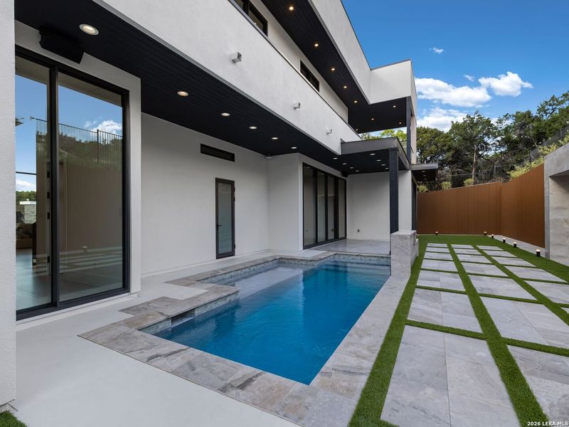 Exterior details and patio area of a home in , San Antonio (Image 27).