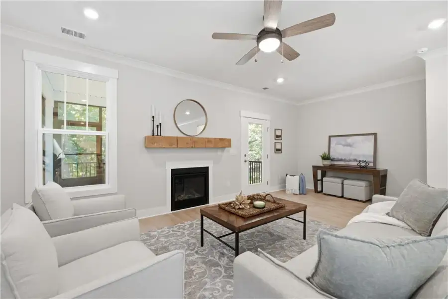 An inviting fireplace serves as the centerpiece of