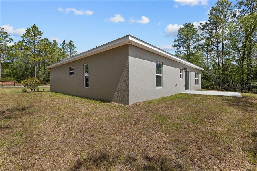 Exterior details and patio area of a home in , Citrus Springs (Image 30).