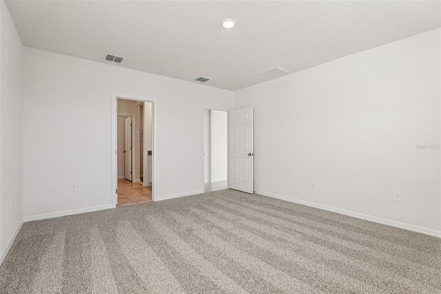 Spacious, unfurnished interior of a new home in Lawson Dunes - Signature Series, Haines City (Image 35). Spacious, unfurnished interior of a new home in Lawson Dunes - Signature Series, Haines City (Image 35).